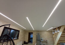 Натяжные потолки: искусство формы, света и звука в современном интерьере